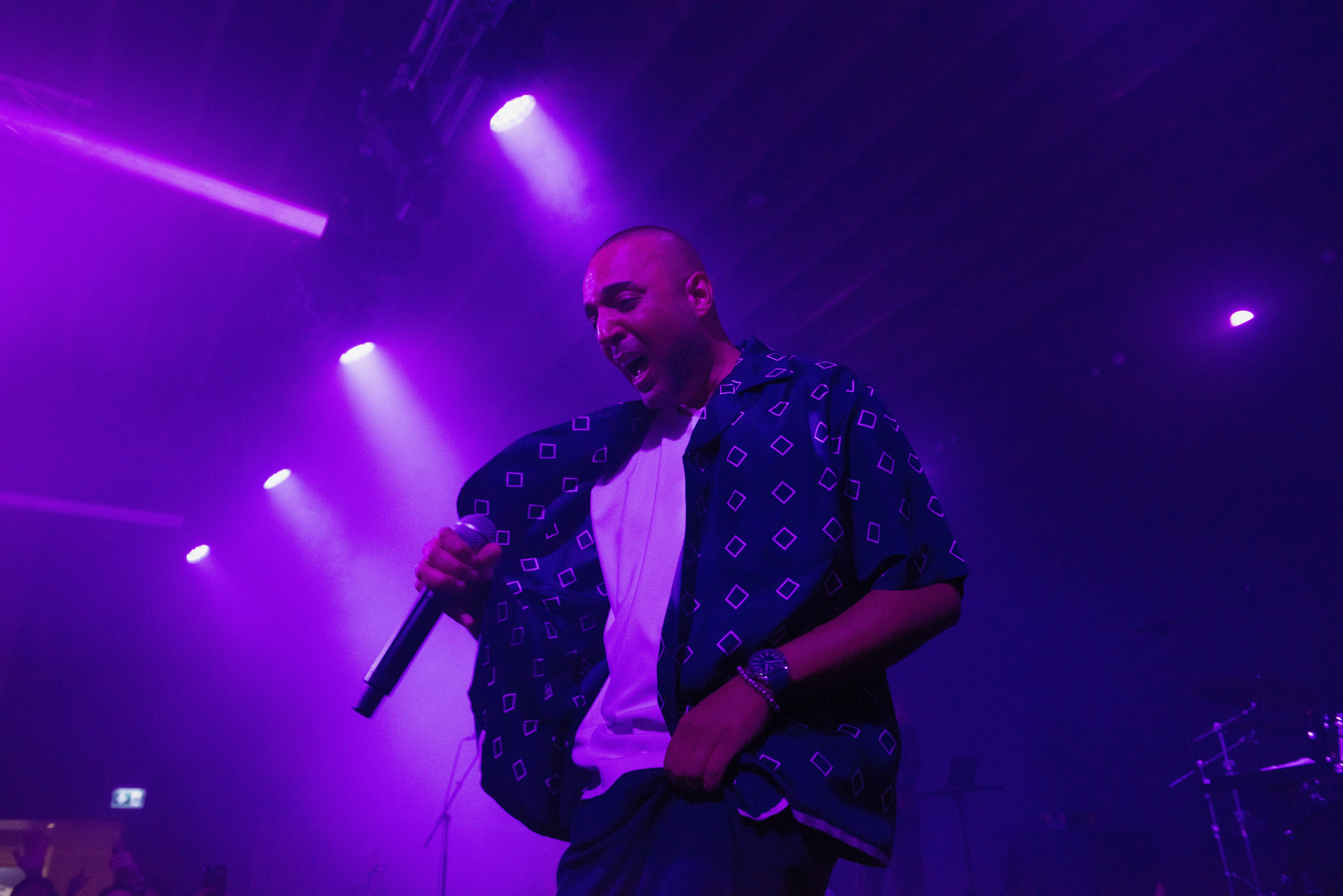 Live concert photography with purple stage lighting