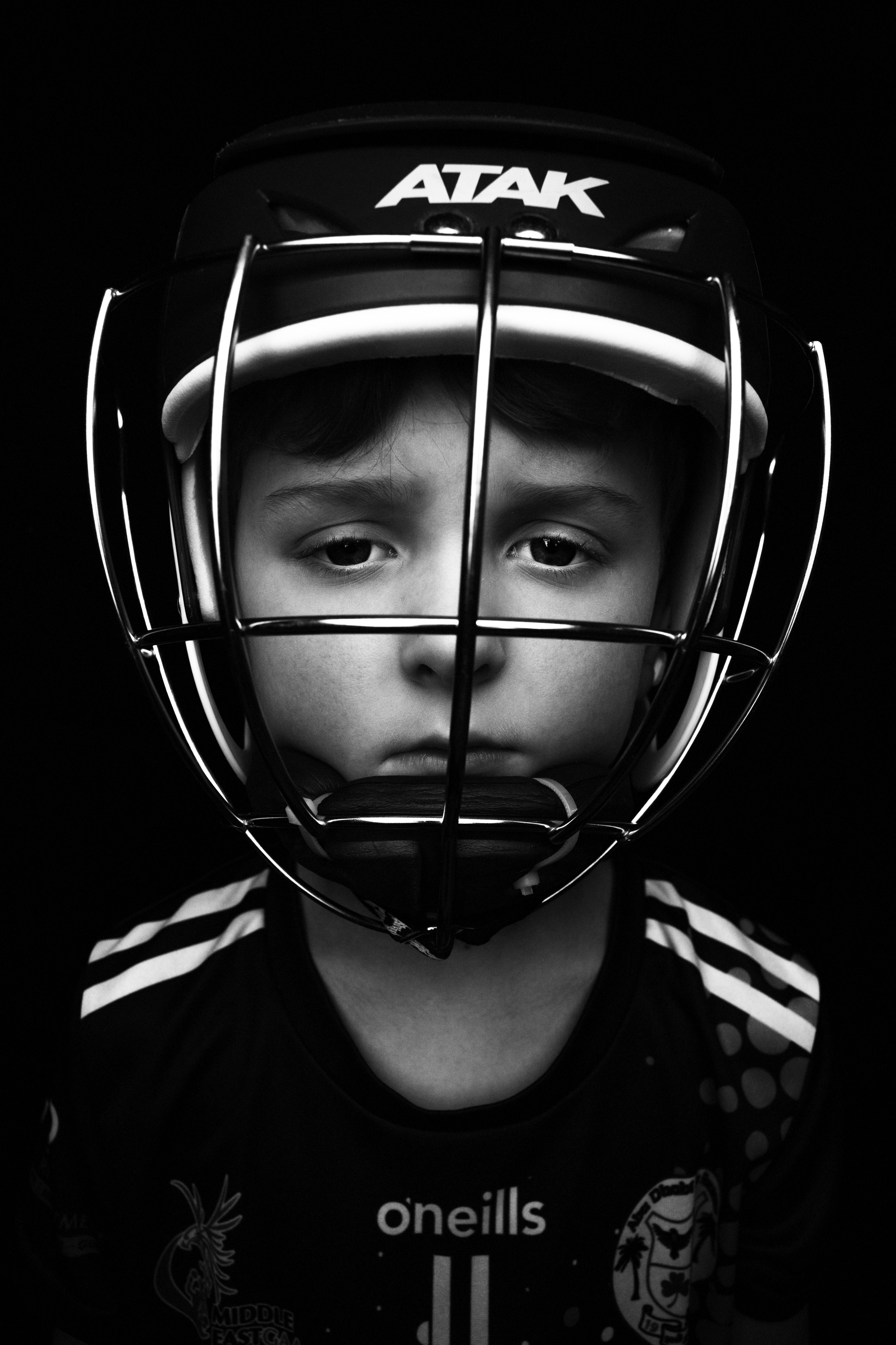 Sport portrait — hurling player in ATAK helmet
